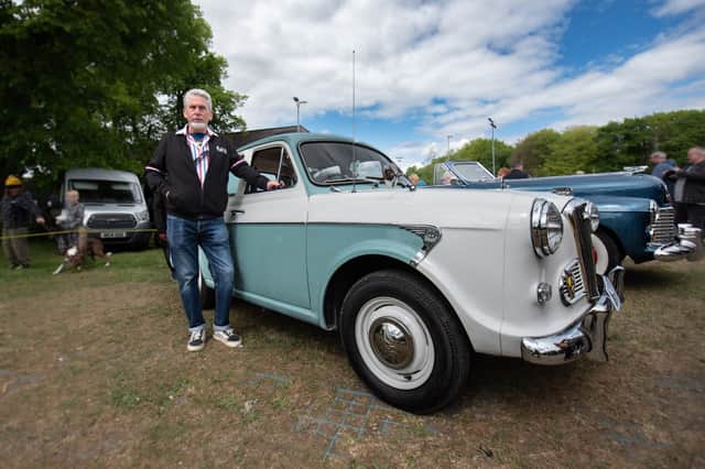 Dennis Jackson stands next to his 1958 Wolesley 1500 classic car at the VE Day Festival in Blackburn. Photo Credit: Lucinda Herbert