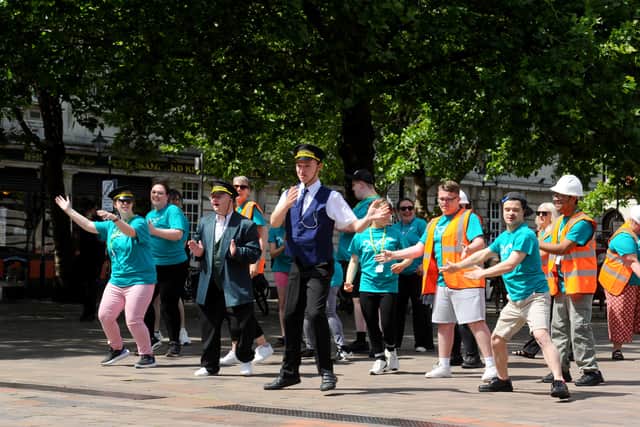 The flashmob saw dancers tell the story of the history of the railway over the past 200 years in Guildhall Square, Portsmouth, on Tuesday, June 17, 2025. City of Portsmouth College has coordinated the group, from a range of special educational needs and disabilities (SEND) organisations, assisted by funding from Great Western Railway's Customer and Community Improvement Fund.