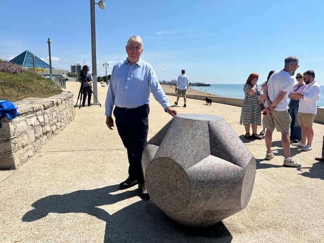 Artist John Maine with the new marker