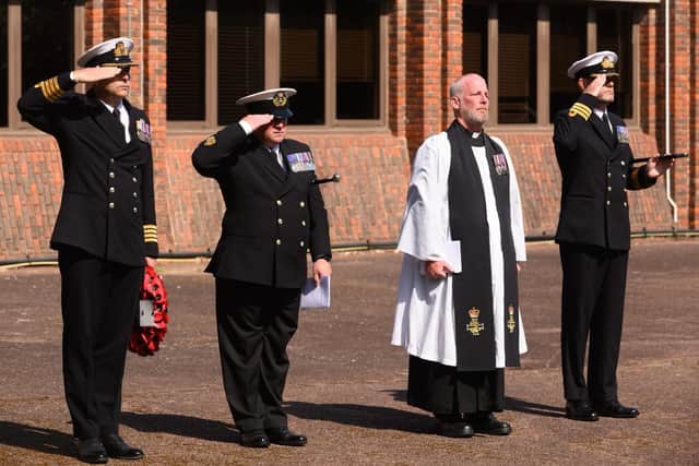 CO, XO, BWO and Chaplain saluting during the last post at the 82nd Anniversary of the Collingwood Bombing. Photograph courtesy of Keith Woodland/Crown Copyright