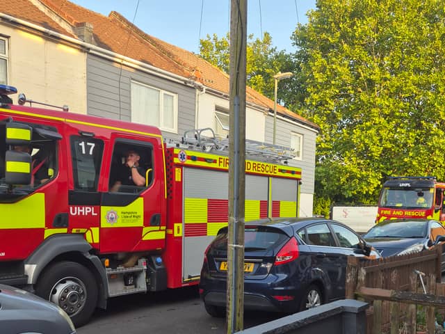 Two boys have been arrested on suspicion of arson after a large fire erupted from a tree and destroyed several garages in Hambrook Road, Gosport.