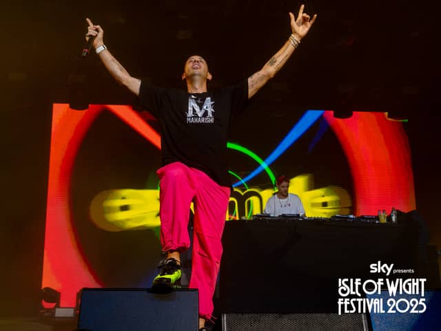 Thousands of people flocked to the Isle of Wight Festival on Thursday to celebrate the start of the four day event. 

Pictured: Example performing at the Isle of Wight Festival 

Picture: Sarah Louise Bennett
