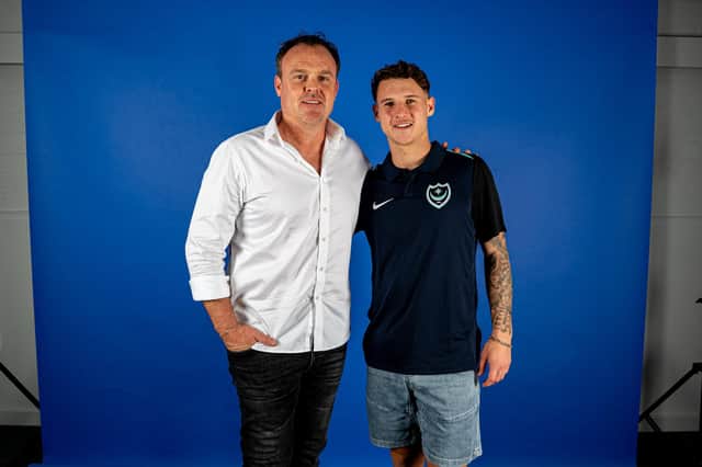Mark Robertson (left), father of Alex, was a surprise face at Adrian Segecic's Pompey unveiling. Picture: Mark Robertson
