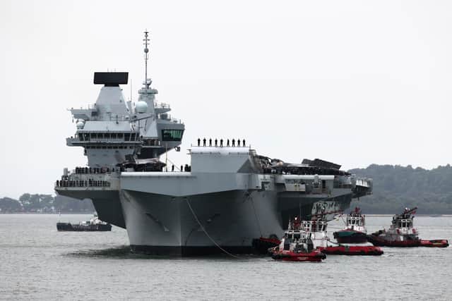 Royal Navy aircraft carrier HMS Prince of Wales sails into Singapore on June 23. She is currently leading the UK Carrier Strike Group on the Indo-Pacific deployment called Operation Highmast.