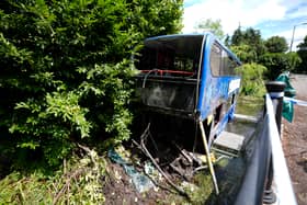 The double-decker bus carrying sixth-form college students crashed off the road and ended up in a river, leaving three people being taken to hospital as "high priority" patients with 14 others treated at the scene.