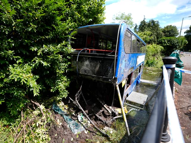 The double-decker bus carrying sixth-form college students crashed off the road and ended up in a river, leaving three people being taken to hospital as "high priority" patients with 14 others treated at the scene.
