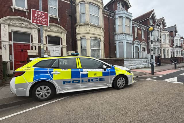Police remain at the scene at Victoria Road North