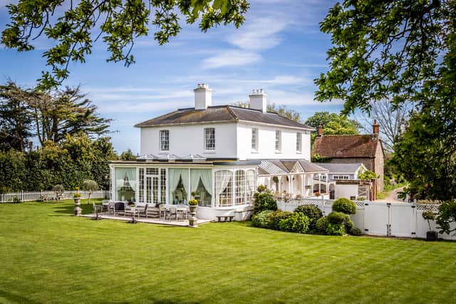 The £3 million house sits in 1.34 acres of private, manicured gardens