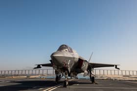 An Indian tourism board has poked fun at the Royal Navy and RAF as an F-35B fighter jet has been stuck at a civilian airport for over two weeks. Pictured: An F-35B Lighting jet on the flight deck of HMS Prince of Wales as the ship passes under the Al Salam Bridge whilst transiting the Suez Canal on route to the Red Sea as part of Operation Highmast, May 24th 2025.