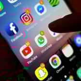 An initiative which aims to cut the risk of harm and death among drug users by giving them digital devices has secured funding to continue its work