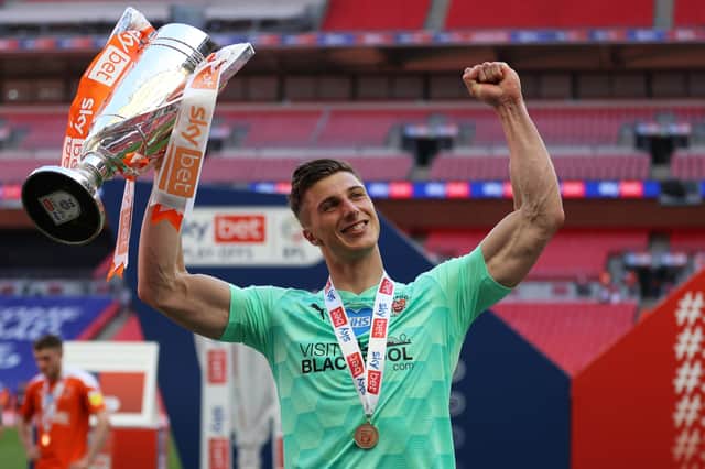 Ex-Morecambe, Blackpool and Reading 'keeper Stuart Moore impresses Pompey on trial as coach says club are open to making an additional signing 