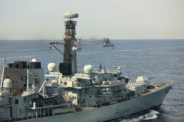 HMS Iron Duke and other Royal Navy assets were deployed from Portsmouth to stalk several Russian ships sailing in British waters. Pictured: Commanding Officer of HMS Iron Duke Commander David Armstrong atop the ship bridge roof during monitoring of RFN Boikiy