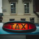 There is outrage after a Wolverhampton-licensed taxi driver was accused of sexual harassment in Portsmouth