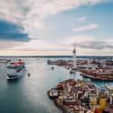 Virgin Voyages Scarlet Lady sails out of Portsmouth harbour. She is expected to make her glorious homecoming after four years away.