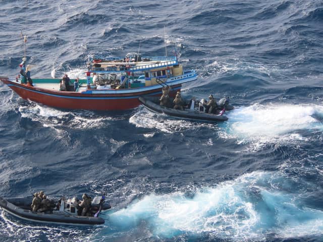 HMS Lancaster seized £30m worth of narcotics during a major drugs bust in the Arabian Sea in May of this year. Pictured: Royal Marines of 42 Commando boarding the suspect vessel, pouncing on a dhow which had 80 packages of narcotics on board.