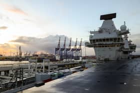 HMS Queen Elizabeth will be leaving Portsmouth tomorrow (July 15) after spending a long period of time at Portsmouth Naval base. Pictured: HMS Queen Elizabeth berthed in Hamburg last year.