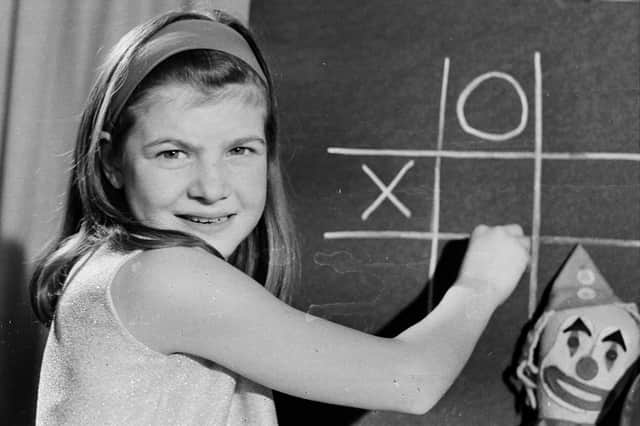 Carole Hersee, the daughter of test card designer George Hersee, posing for a new version of the famous Test Card F in 1969