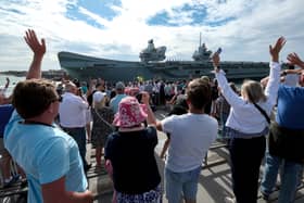 HMS Queen Elizabeth passes the Round Tower as she leaves HMNB Portsmouth. After a long period of maintenance, the Royal Navy aircraft carriers heading for the Rosyth dry dock for further upgrades and tests.