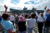 HMS Queen Elizabeth passes the Round Tower as she leaves HMNB Portsmouth. After a long period of maintenance, the Royal Navy aircraft carriers heading for the Rosyth dry dock for further upgrades and tests.