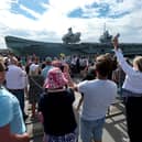 HMS Queen Elizabeth passes the Round Tower as she leaves HMNB Portsmouth. After a long period of maintenance, the Royal Navy aircraft carriers heading for the Rosyth dry dock for further upgrades and tests.