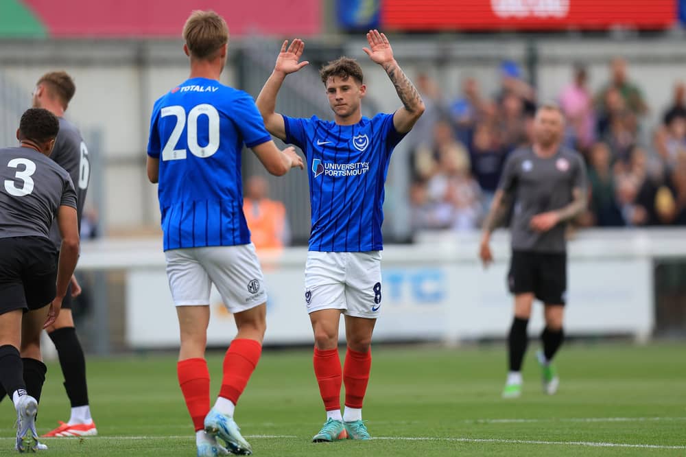 Adrian Segecic celebrates his opening goal against Woking with Thomas Waddingham. Picture: Simon Roe/ProSportsImages