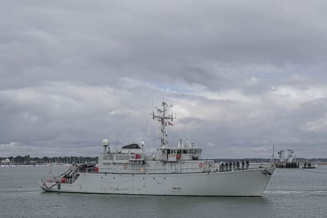 UNS Mariopol being towed into HMNB Portsmouth.