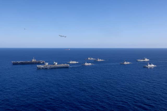 Left to right  American aircraft carrier, USS George Washington, British Aircraft Carrier HMS Prince of Wales, Canadian Warship HMCS Vill De Quebec, Norwegian Warship HNoMS Roald Amundsen, United States Warships USS Robert Smalls, USS Shoup, Australian Warship HMAS Sydney, British ship RFA Tidespring and British Warship HMS Dauntless.