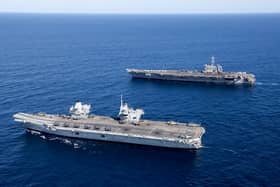 HMS Prince of Wales completed Exercise Talisman Sabre off the coast of Australia with her carrier strike group, joining forces with American sailors. Pictured Top to Bottom: United States Aircraft Carrier, USS George Washington and UK Aircraft Carrier, HMS Prince of Wales.