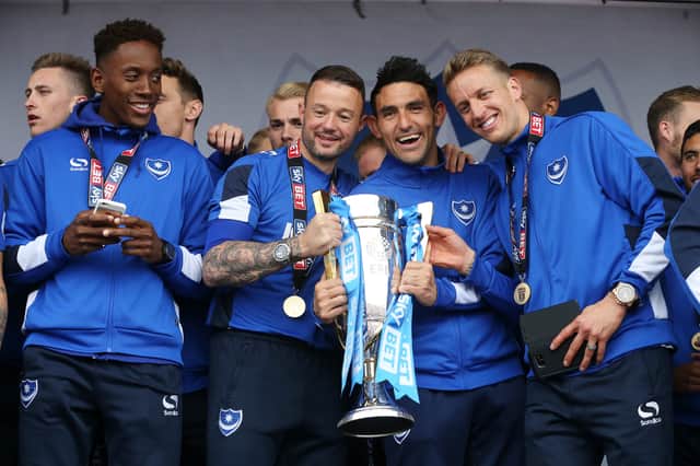 Noel Hunt (second left) winning the League Two title with Pompey in May 2017 - now he's manager of Saturday's opponents Reading. Picture: Joe Pepler