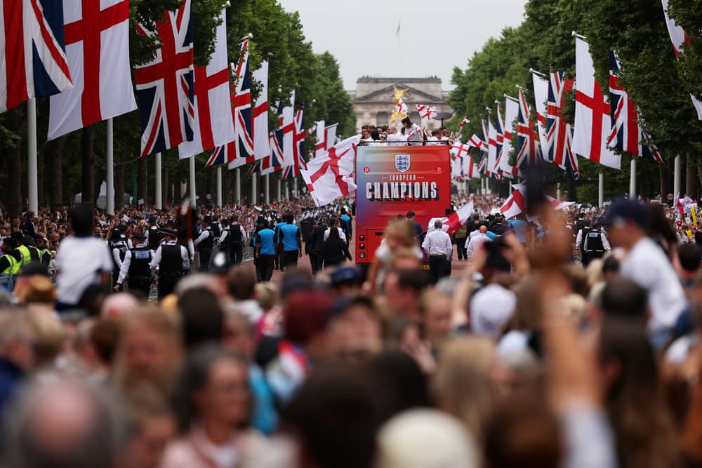 The England bus makes its way down The Mall during the England Women's team victory parade and celebration on July 29, 2025 in London, England.