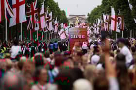 The England bus makes its way down The Mall during the England Women's team victory parade and celebration on July 29, 2025 in London, England.