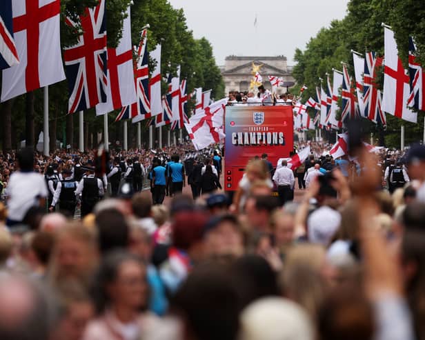The England bus makes its way down The Mall during the England Women's team victory parade and celebration on July 29, 2025 in London, England.