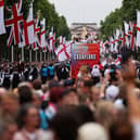 The England bus makes its way down The Mall during the England Women's team victory parade and celebration on July 29, 2025 in London, England.