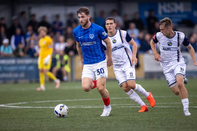 Reuben Swann on the charge in Pompey's goalless draw with the Hawks on Tuesday night. Picture: Alex Shute