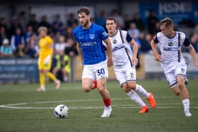 Reuben Swann on the charge in Pompey's goalless draw with the Hawks on Tuesday night. Picture: Alex Shute