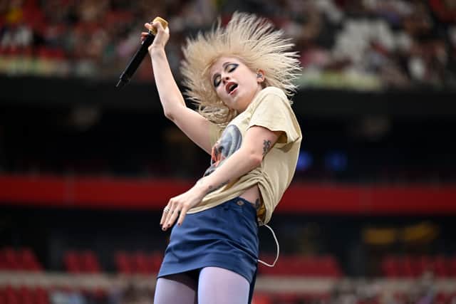 Paramore lead singer Hayley Williams has surprised fans with a secret 17 tracks drop - by virtue of a 16 digit code available to those who bought from her hair dye company.
