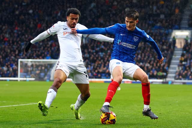 Florian Bianchini competes with Freddie Potts at Fratton Park in January. Pic: Getty
