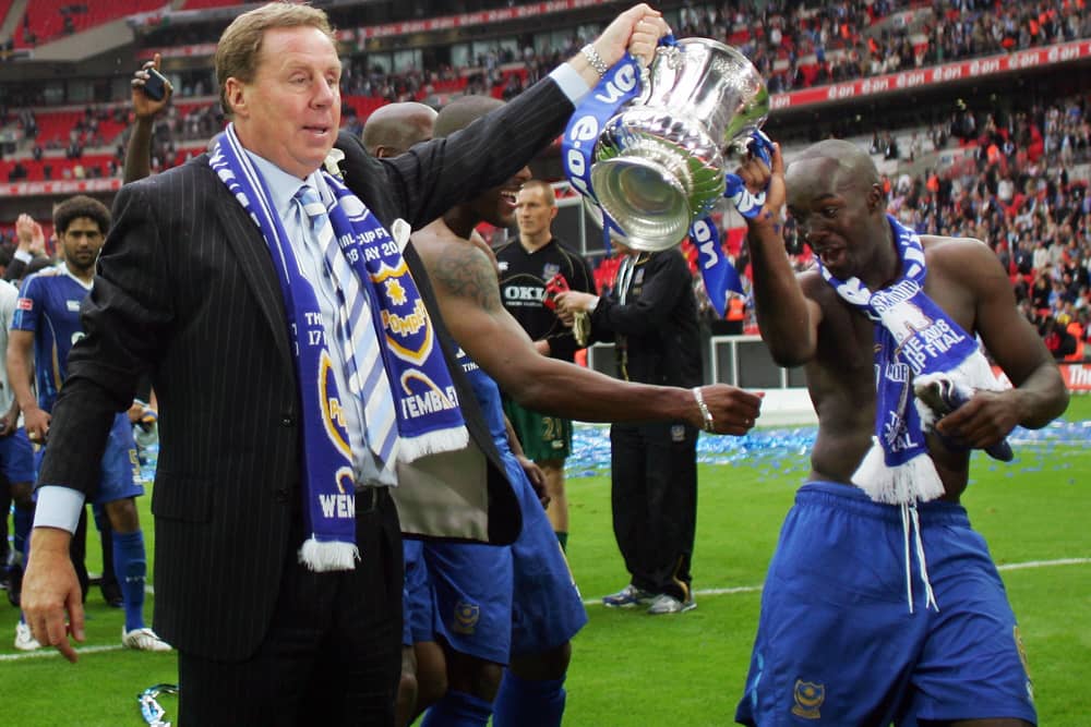 Harry Redknapp, who guided Portsmouth FC to an FA Cup win in 2008, has had his Dorset mansion raided by masked burglars carrying hammers. Pictured: Harry Redknapp (L) and Lassana Diarra (R) holding the F.A Cup aloft after winning the final against Cardiff City at Wembley Stadium in London on May 17, 2008. Portsmouth won the game 1-0.