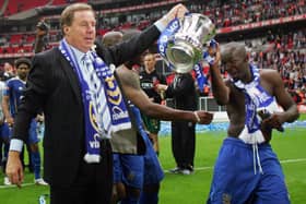 Harry Redknapp, who guided Portsmouth FC to an FA Cup win in 2008, has had his Dorset mansion raided by masked burglars carrying hammers. Pictured: Harry Redknapp (L) and Lassana Diarra (R) holding the F.A Cup aloft after winning the final against Cardiff City at Wembley Stadium in London on May 17, 2008. Portsmouth won the game 1-0.