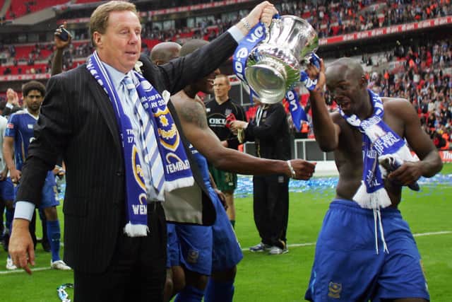 Harry Redknapp, who guided Portsmouth FC to an FA Cup win in 2008, has had his Dorset mansion raided by masked burglars carrying hammers. Pictured: Harry Redknapp (L) and Lassana Diarra (R) holding the F.A Cup aloft after winning the final against Cardiff City at Wembley Stadium in London on May 17, 2008. Portsmouth won the game 1-0.