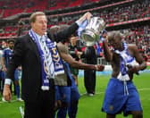 Harry Redknapp, who guided Portsmouth FC to an FA Cup win in 2008, has had his Dorset mansion raided by masked burglars carrying hammers. Pictured: Harry Redknapp (L) and Lassana Diarra (R) holding the F.A Cup aloft after winning the final against Cardiff City at Wembley Stadium in London on May 17, 2008. Portsmouth won the game 1-0.