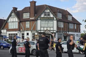 Police try to calm the situation down.