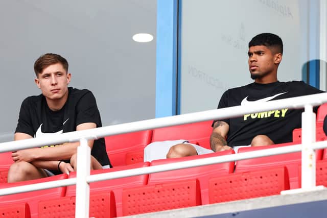 New boys Mark Kosznovszky and Luke Le Roux watching Pompey’s friendly against Reading in July shortly after their arrivals. Picture: Paul Phelan/ProSportsImages