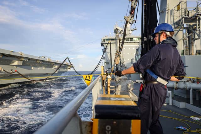 Royal Fleet Auxiliary personnel onboard RFA Tidespring whilst conducting a Replenishment at Sea with HMS Prince of Wales on Operation Highmast.