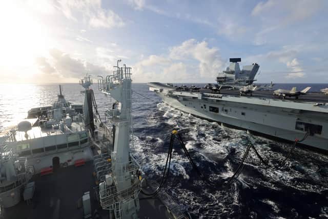 HMS Prince of Wales seen from RFA Tidespring whilst conducting a Replenishment at Sea. The Royal Navy flagship was resupplied in the Philippine Sea ahead of the UK Carrier Strike Group sailing to Japan.