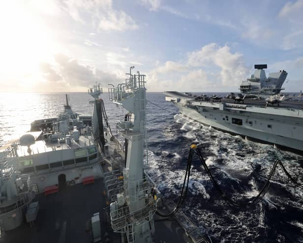 HMS Prince of Wales seen from RFA Tidespring whilst conducting a Replenishment at Sea. The Royal Navy flagship was resupplied in the Philippine Sea ahead of the UK Carrier Strike Group sailing to Japan.