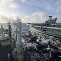 HMS Prince of Wales seen from RFA Tidespring whilst conducting a Replenishment at Sea. The Royal Navy flagship was resupplied in the Philippine Sea ahead of the UK Carrier Strike Group sailing to Japan.