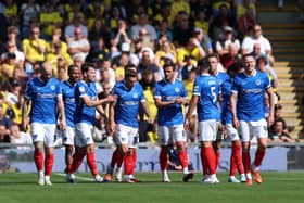 The Pompey player celebrate Adrian Segecic's winner at Oxford United