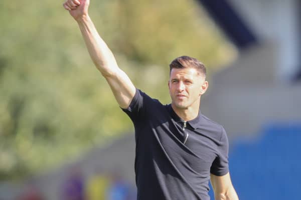 Pompey head coach John Mousinho was delighted with Adrian Segecic's dream debut. Picture: Alun Roberts/ProSportsImages