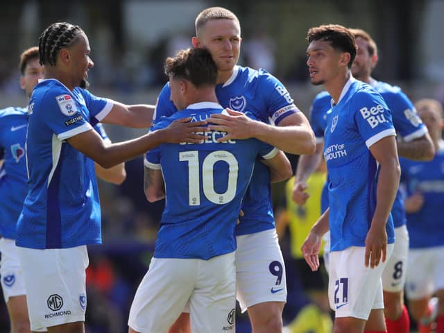 Colby Bishop congratulates Adrian Segecic following his first-half winner against Oxford United at the Kassam Stadium